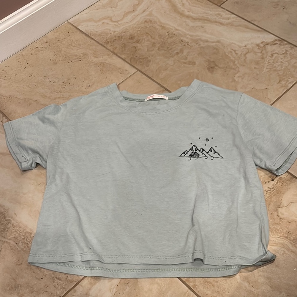 Light Blue T-Shirt with Mountain Design